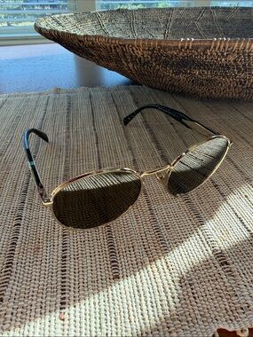 Prada SPR 56Z Gold Frame Sunglasses with Black/Green Marbled Temples. Like New!